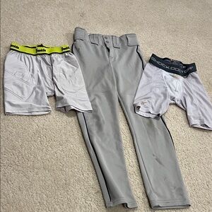 Boys baseball bundle. Size youth medium. Baseball pants and cup sliding shorts.